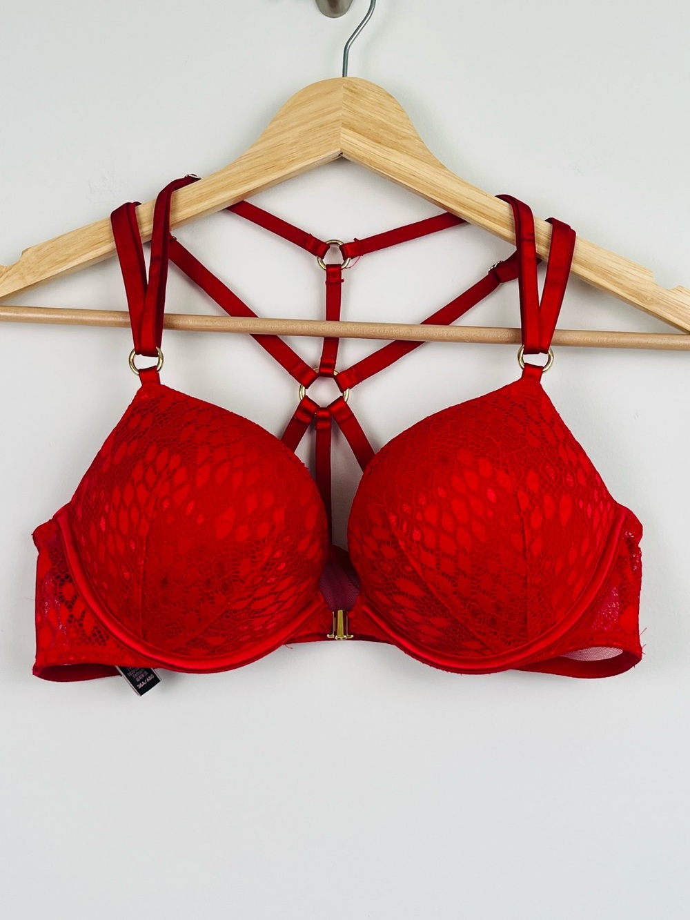 Victoria’s Secret red Bombshell Plunge lace overlay strappy padded bra, 36A.